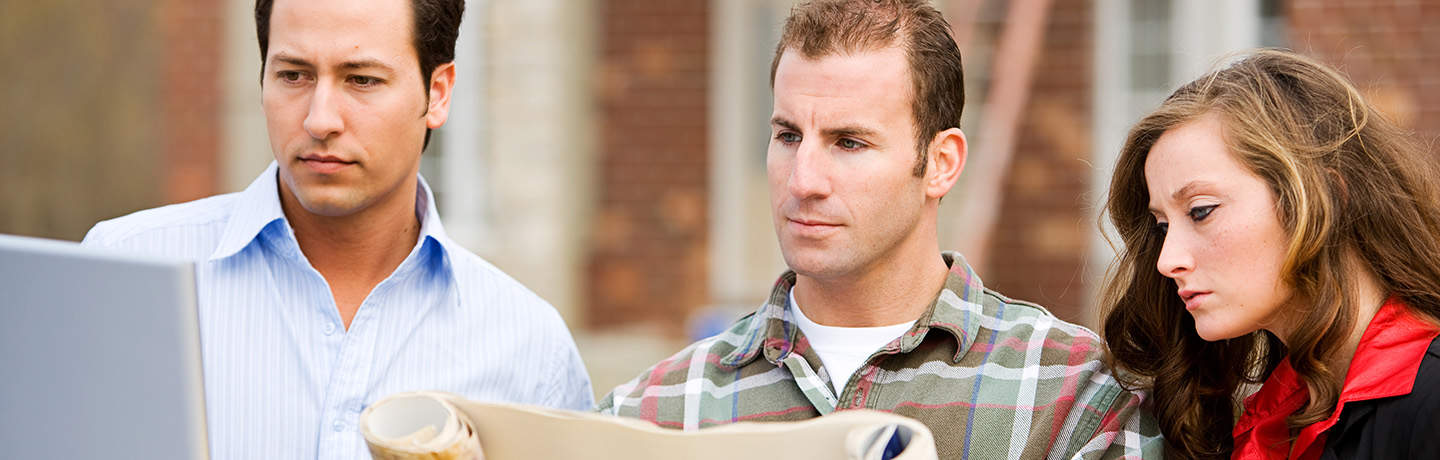 Homeowner Reviewing Plans with their Contractor